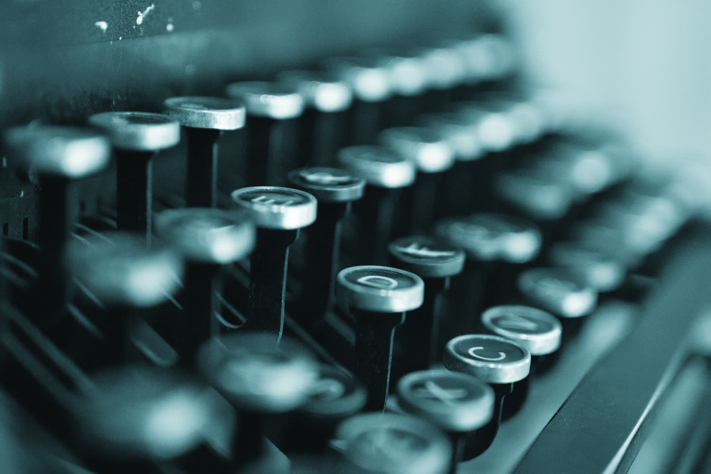 The keys of a mechanical adding machine