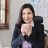 asian-woman-holding-a-cup-of-coffee-at-work-busine-2025-03-08-15-31-58-utc.jpg